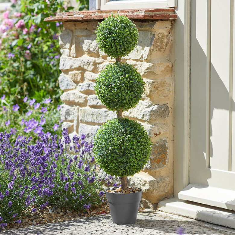 Artificial clearance topiary trees